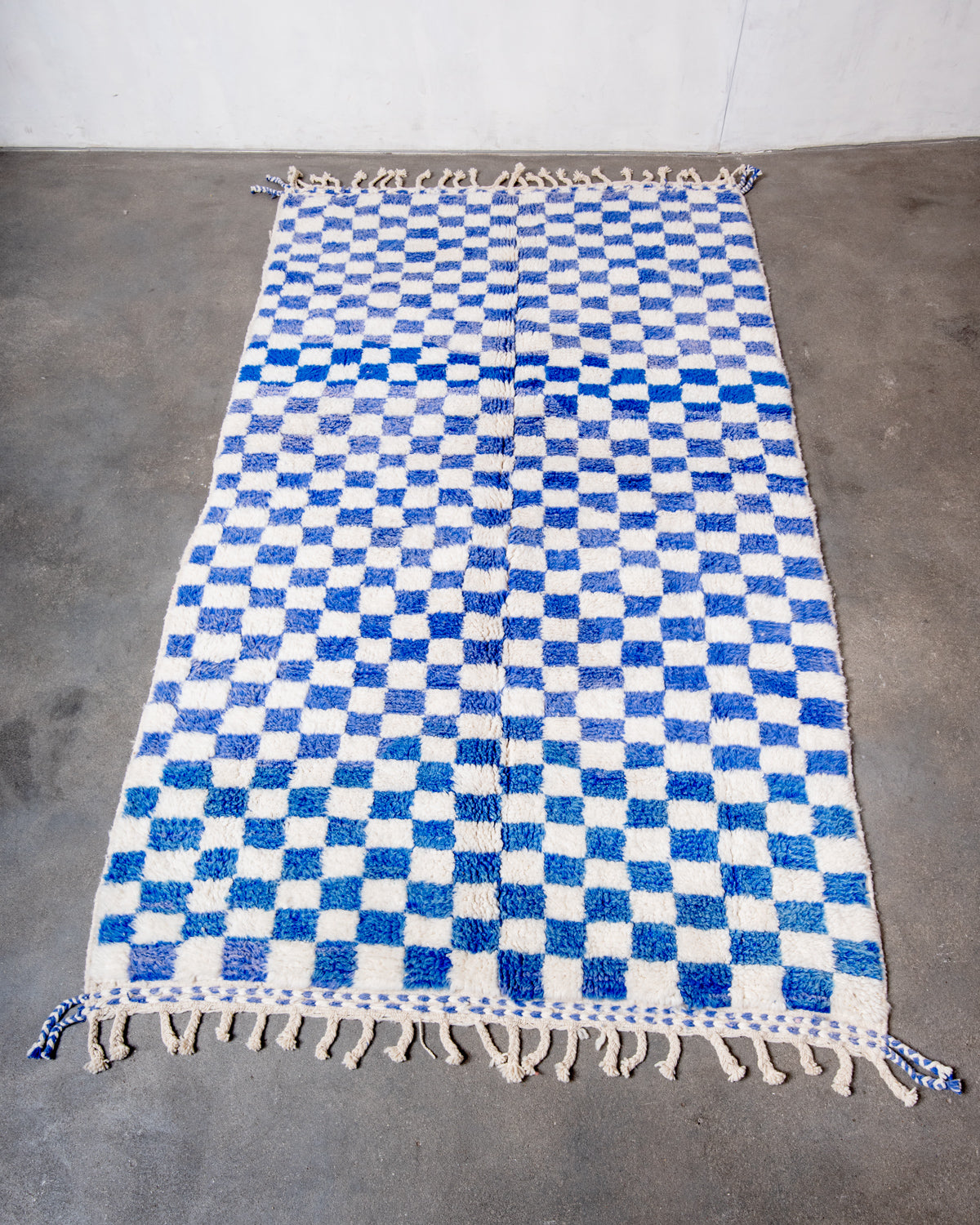 Modern, designer, handcrafted Berber rug from Morocco. Beniourain carpet with beautiful colours and patterns and fluffy wool texture.
